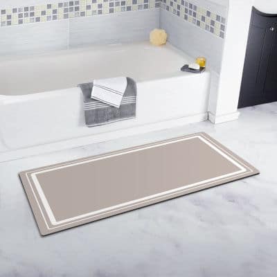 A low-profile, non-slip floor mat keeps seniors from slipping or tripping in the bathroom