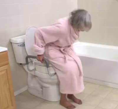 a raised toilet seat helps seniors be independent in the bathroom