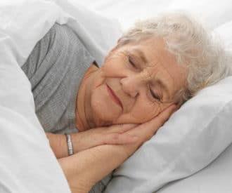 Weighted blankets for dementia reduce anxiety, promote deep sleep, calm nerves, and provide comfort