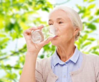 Use these creative tips to get seniors to drink more water and prevent dehydration