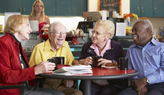 A Memory Café is a supportive environment where people with dementia and family caregivers can socialize, build support networks, and enjoy dementia-friendly activities